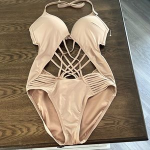 Kenneth Cole bathing suit new with tags. Never worn. Push up bra